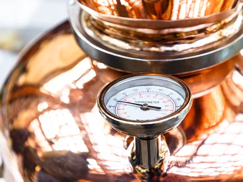 News Thermometer On A Copper Still